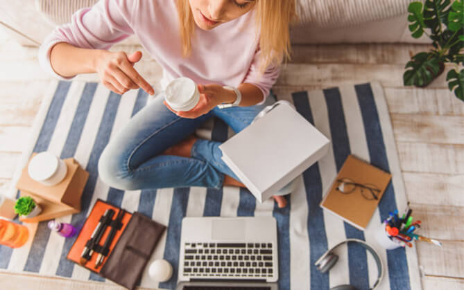 Woman testing various relax and wellness products