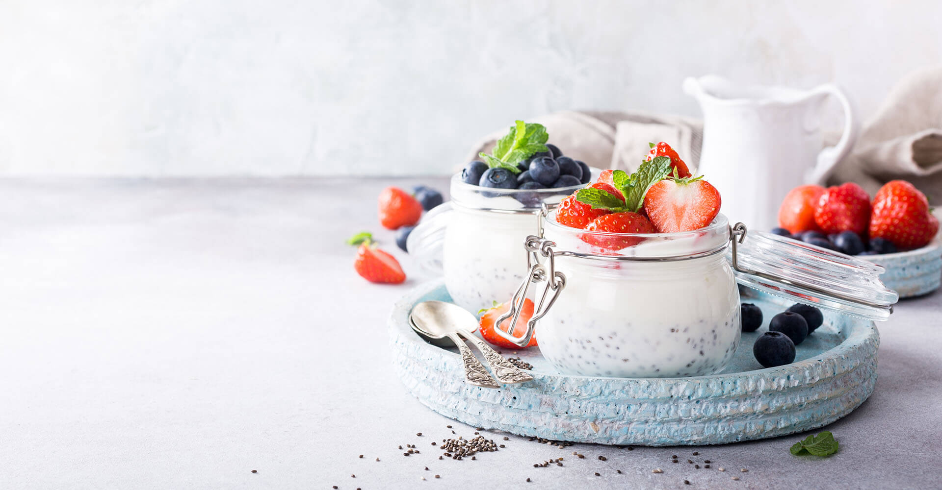 Different superfoods like berries, strawberries and chia seeds along with cottage cheese