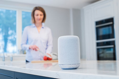 A smart home device that sits in the kitchen