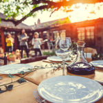 Family sets table for garden party - 500