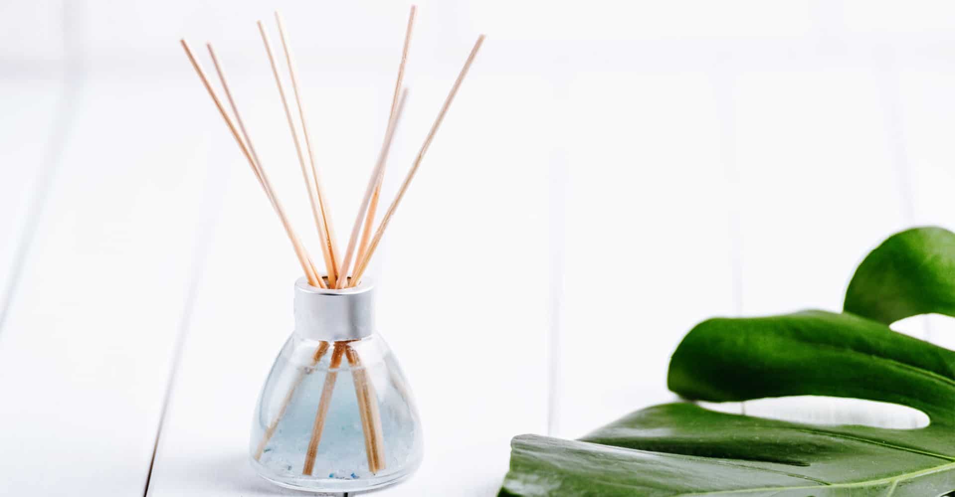 Room fragrance with sticks