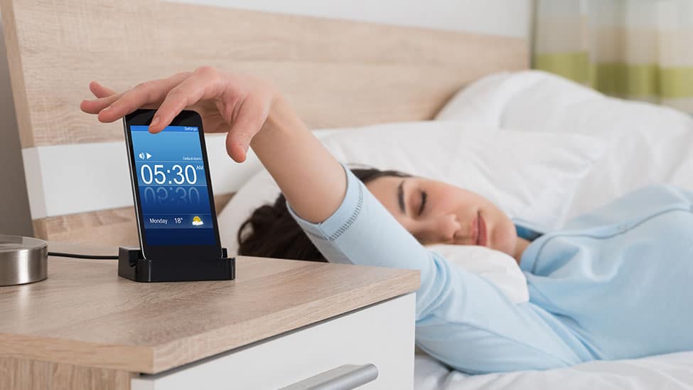 alarm clock app wakes woman in the morning