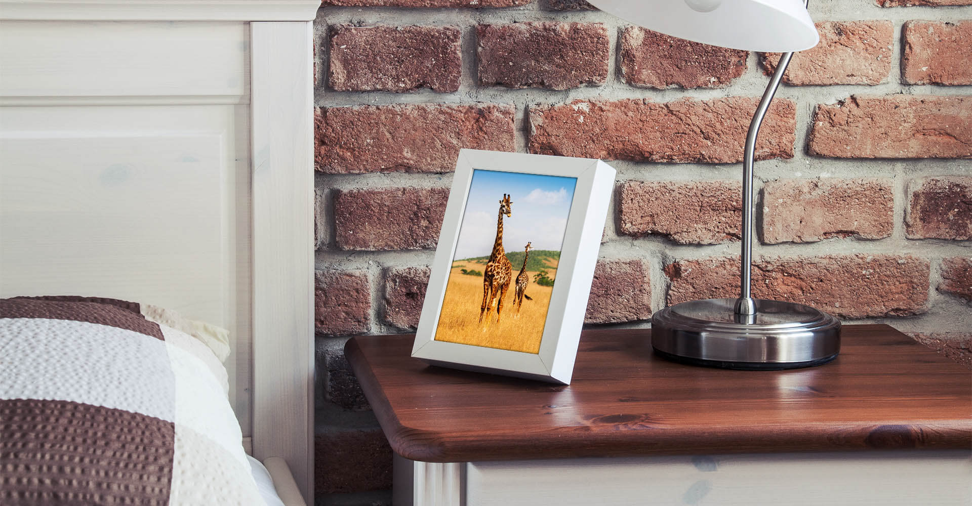 Digital picture frame on bedside table